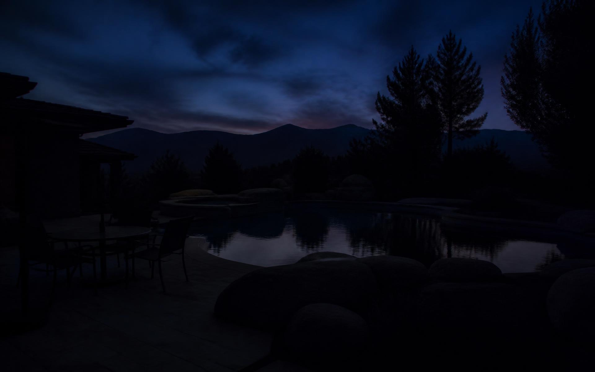 Dark unlit backyard at dusk in Northern Nevada